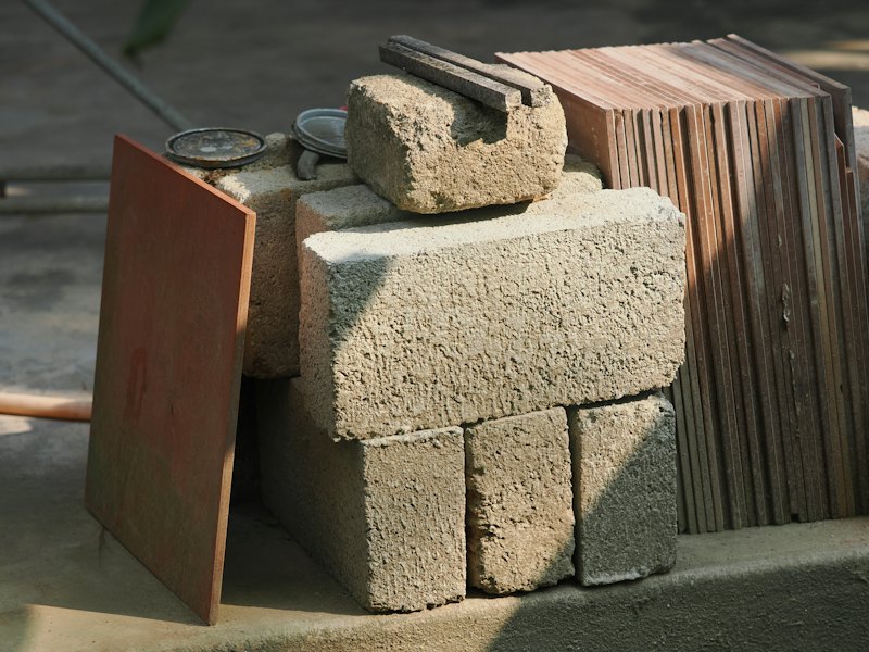 Stacked concrete blocks and building materials
